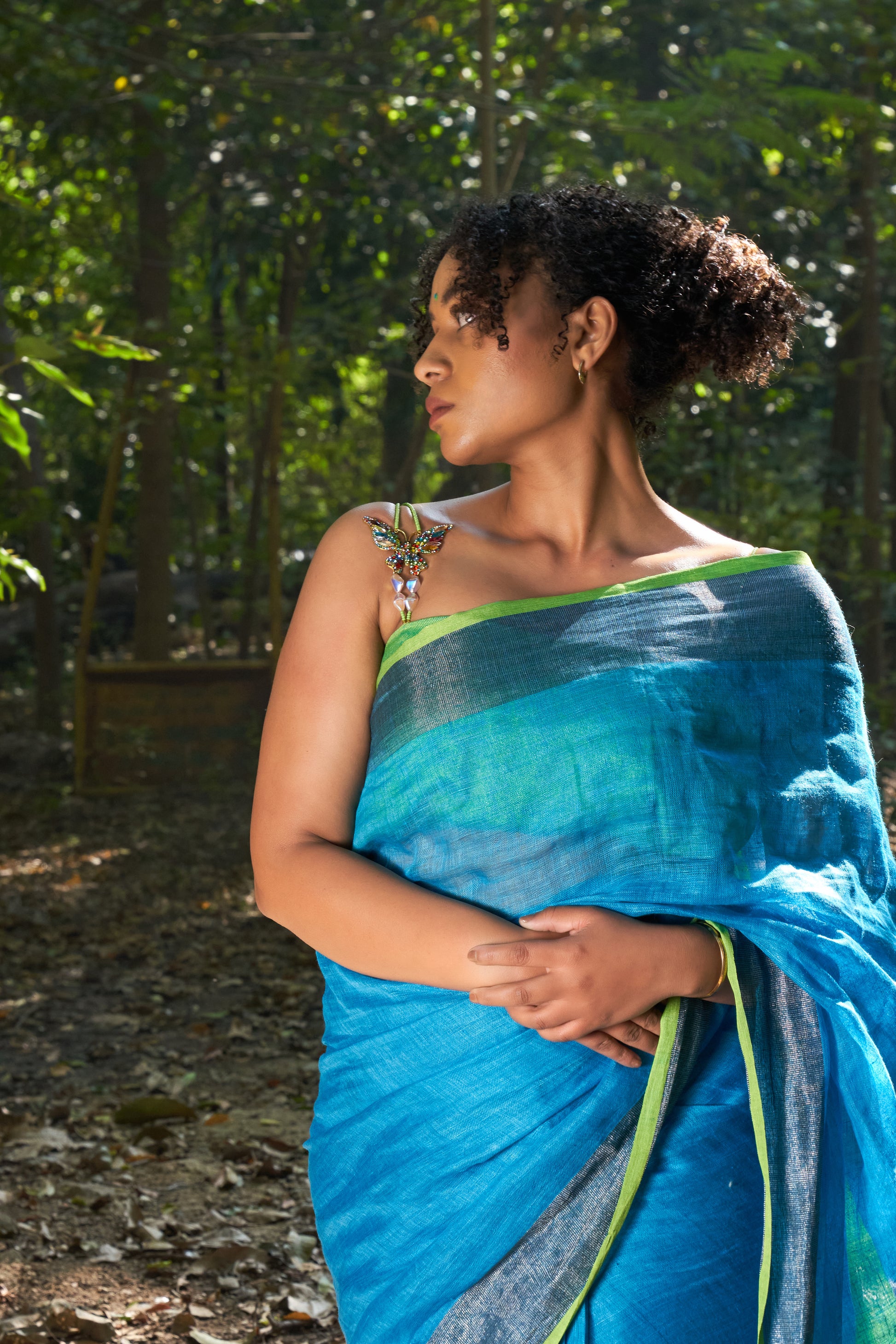 Wild Butterfly bra straps styles by a lady very elegantly with a saree